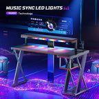 Scrivania da Gaming a L con Supporto Monitor, Presa di Corrente, Luce LED, Portabicchieri e Supporto Controller – 41.6'' / 57''