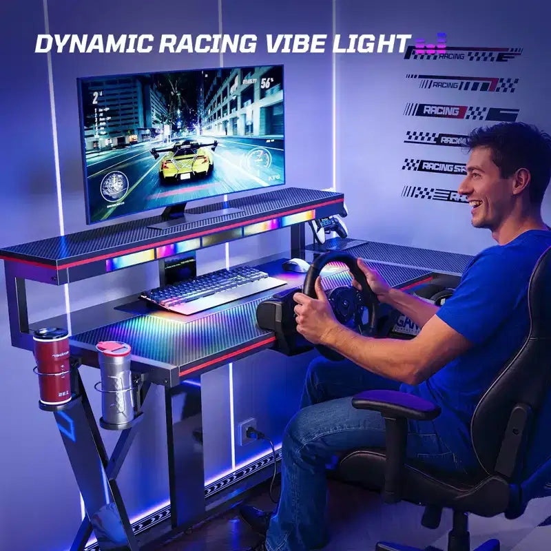 Scrivania da Gaming a L con Supporto Monitor, Presa di Corrente, Luce LED, Portabicchieri e Supporto Controller – 41.6'' / 57''