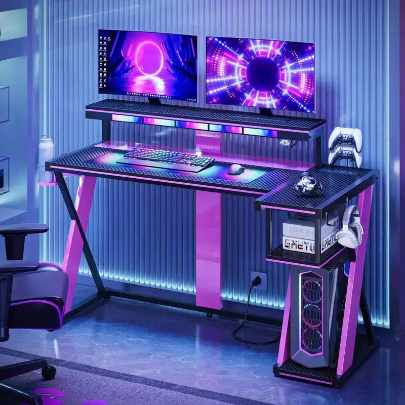 Scrivania da Gaming a L con Supporto Monitor, Presa di Corrente, Luce LED, Portabicchieri e Supporto Controller – 41.6'' / 57''