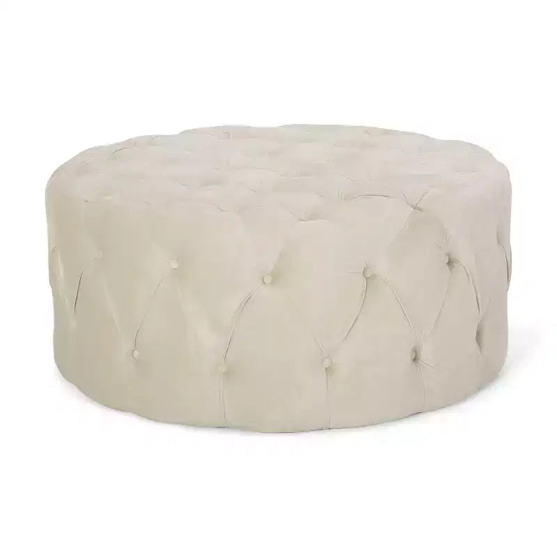 Pouf rotondo in velluto trapuntato