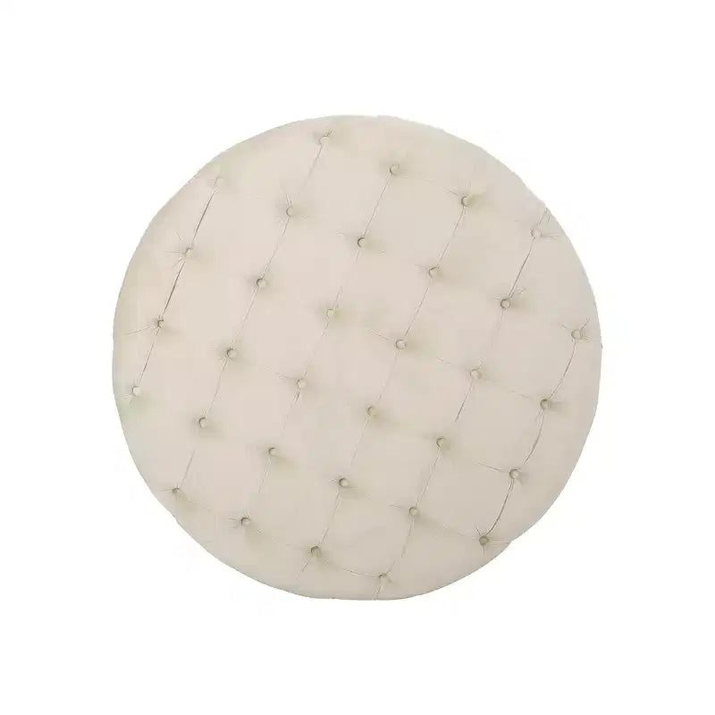 Pouf rotondo in velluto trapuntato