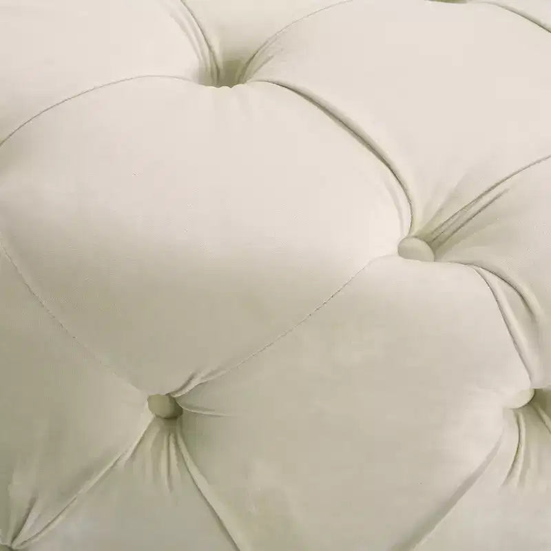 Pouf rotondo in velluto trapuntato