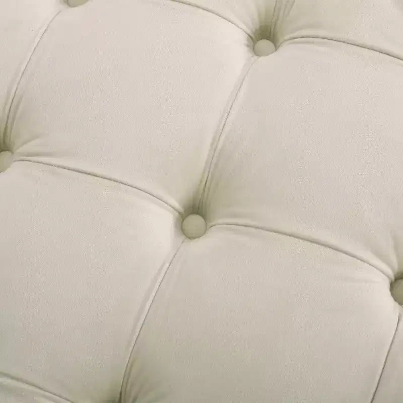 Pouf rotondo in velluto trapuntato