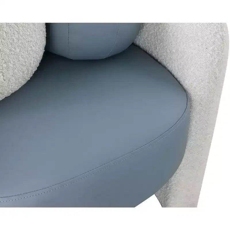 Poltrona in pelle vegana e tessuto Boucle Acadia