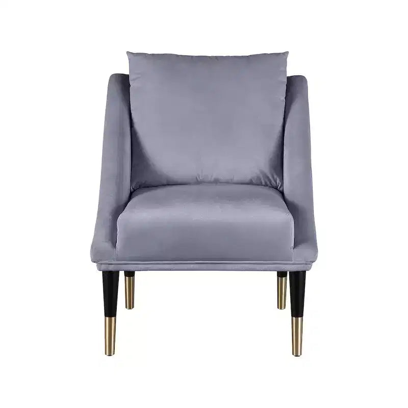 Poltrona in velluto con gambe in legno