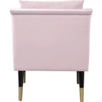 Poltrona in velluto con gambe in legno